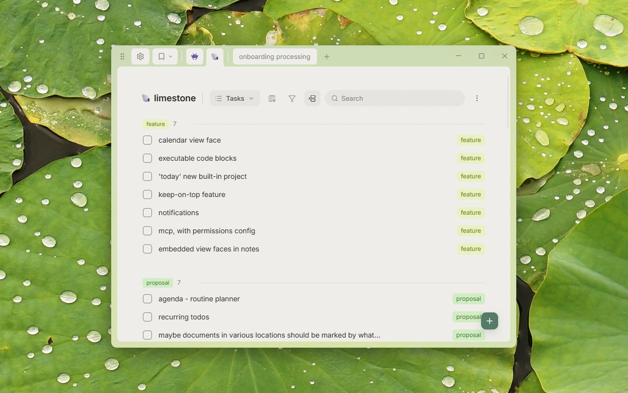 A task list window with the wallpaper showing through its mica background